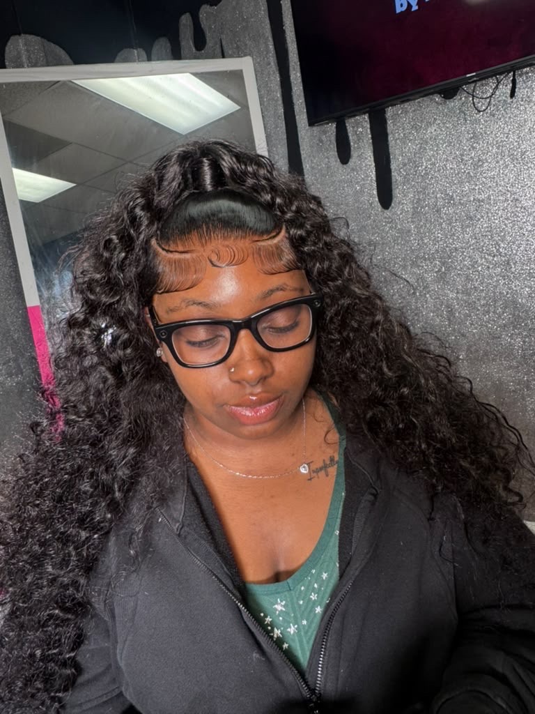 Shaylon wearing AK Royal Tresses 28 inch Deep Wave wig